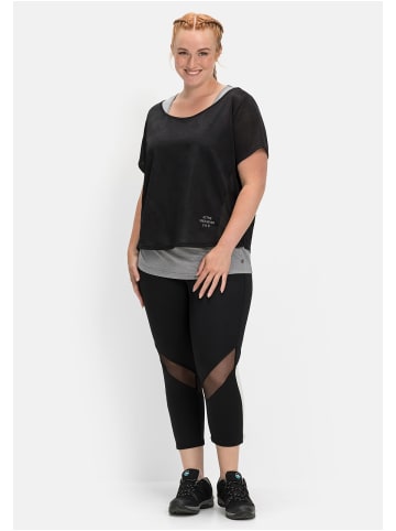 sheego Funktionsleggings in schwarz-grau