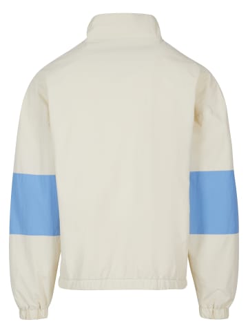 FUBU Track Jackets in creme/light blue