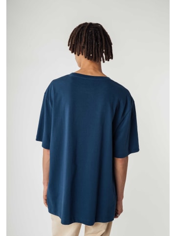 MELA Oversized T-Shirt schwer BHAJAN