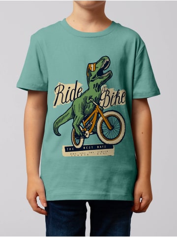 wat? Apparel T-Shirt T-Rex Fahrrad in Teal Monstera