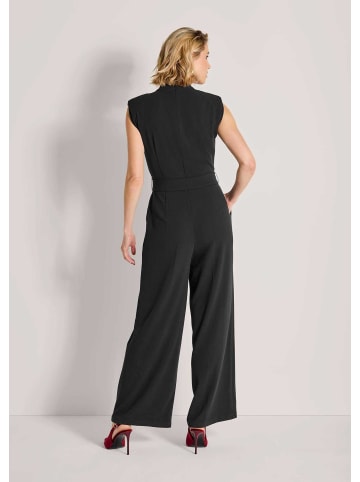 MADELEINE Eleganter Jumpsuit mit Stehkragen in schwarz