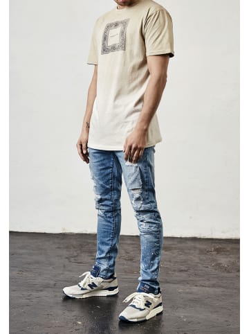 Cayler & Sons Pants in distressed light blue/white