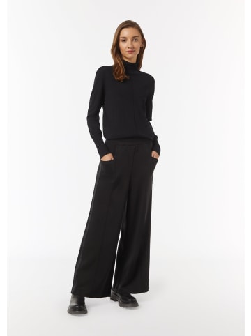 comma CI Hose lang in Schwarz