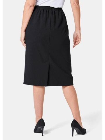 GOLDNER Kurzgröße:  Knitterfreier Reiseschlupfrock in schwarz