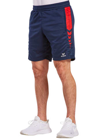 erima Six Wings Shorts in new navy/rot