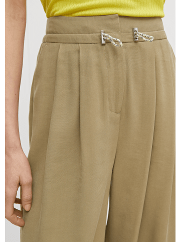 comma CI Hose lang in Olive