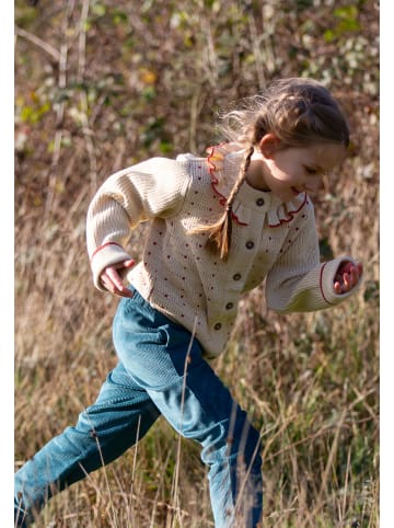 Little Green Radicals Kuschelige Strickjacke mit Rüschen in Creme