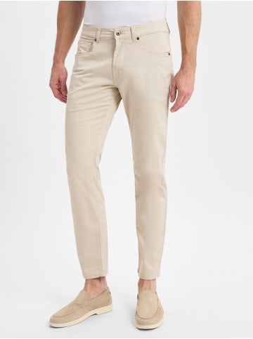 Andrew James Hose in sand