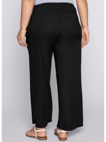 sheego Schlupfhose in schwarz