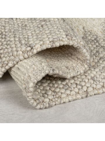 KADIMA DESIGN Wollteppich mit Noppeneffekt und geometrischem Bordürendesign in Beige