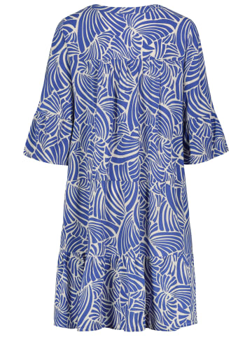 Sublevel Gemusterte Tunikabluse mit Rüschenärmeln und Volants in Hellblau