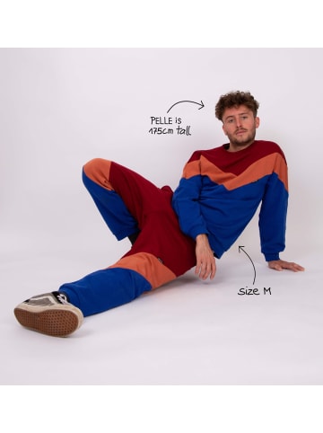 MANITOBER Cut & Sew Jogginghose in Red/Rust/Blue