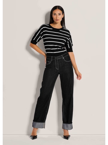 MADELEINE Weite Jeans mit fixiertem Aufschlag in schwarz