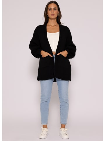 SASSYCLASSY Oversize Strick-Cardigan in Schwarz