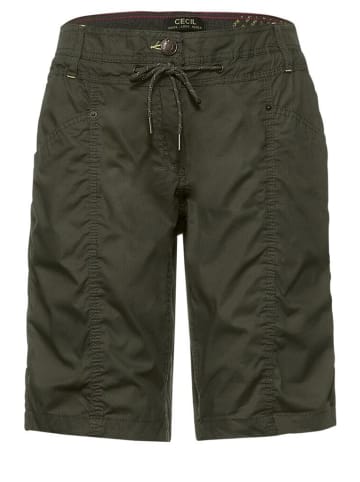 Cecil Short in utility olive