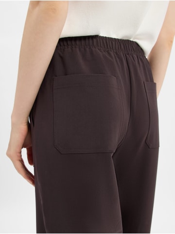 OPUS Hose Myha barrel city in schoko