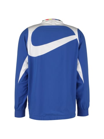 Nike Performance Trainingsjacke F.C. Joga Bonito 2.0 Woven AWF in blau / weiß