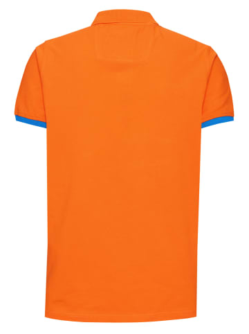 Rusty Neal Kontrast Polo Pique Shirt Regular Fit in Orange / Blau
