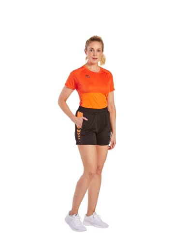 erima Six Wings Shorts in schwarz/new orange