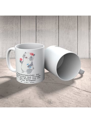 Mr. & Mrs. Panda Teetasse Ergotherapeutin Superhelden mit Spruch in Weiß