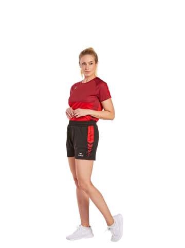 erima Six Wings Shorts in schwarz/rot