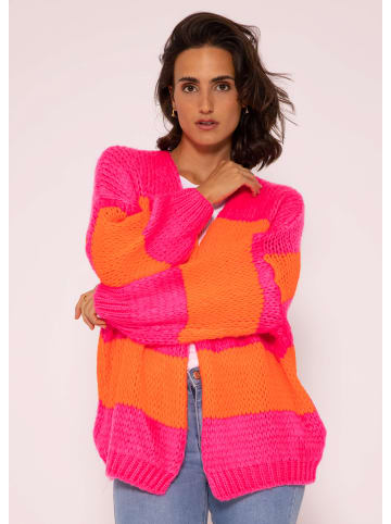 SASSYCLASSY Oversize Strick-Cardigan in Orange, Pink