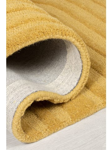 KADIMA DESIGN Handgetufteter Wollteppich in Pastellfarben in Senfgelb