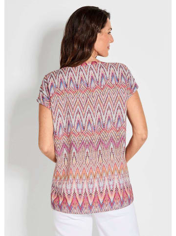 GOLDNER Kurzgröße:  Kurzarm Printbluse für Damen multicolor in orange / gemustert