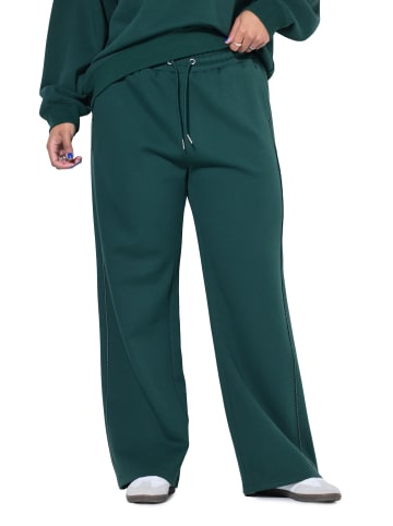 Studio Untold Hosen in dunkelgrün