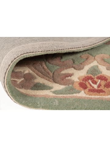 KADIMA DESIGN Traditioneller Wollteppich mit handgeschnitzten Details in Grün-Beige