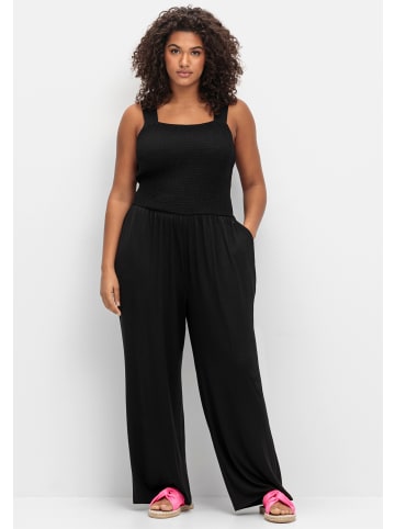sheego Jumpsuit in schwarz