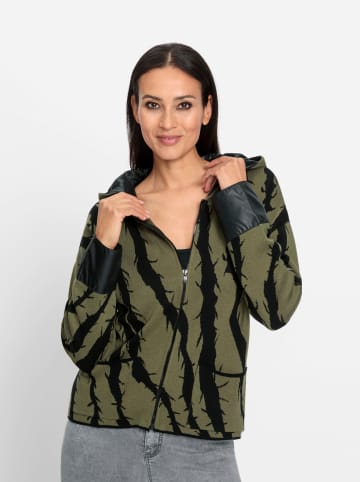 Heine Kapuzenstrickjacke in schwarz-oliv-gemustert