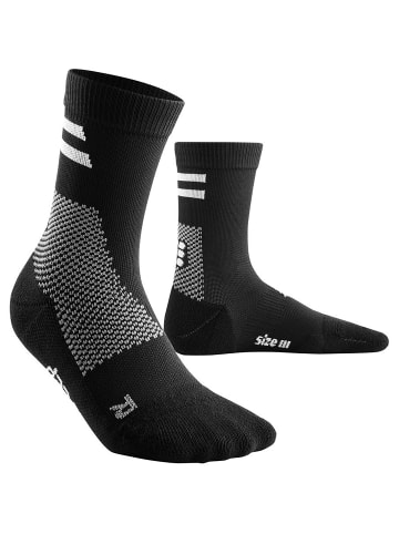 cep TRAINING COMPRESSISOCKSMID CUT in Schwarz