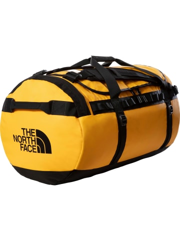 The North Face Reisetasche BASE CAMP DUFFEL - L in summit gold-tnf black