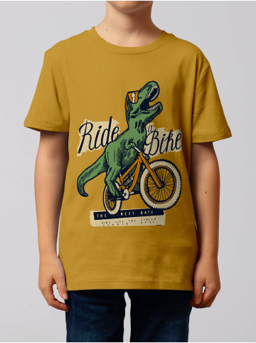 wat? Apparel T-Shirt T-Rex Fahrrad in Ocker