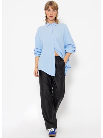 SASSYCLASSY Oversize Musselin Bluse in Hellblau