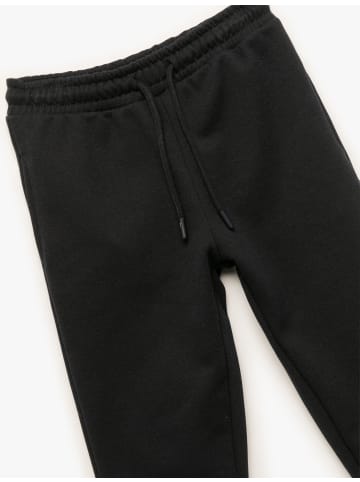 KOTON SWEAT BOTTOMS in Marineblau