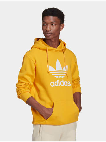 adidas Kapuzenpullover in active gold/white