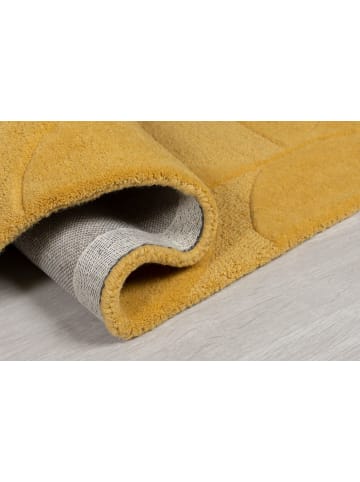 KADIMA DESIGN Eleganter Wollteppich, rutschfest und komfortabel in Senfgelb