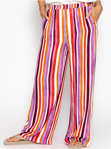 SASSYCLASSY Gemusterte Hose mit weitem Bein in Pink