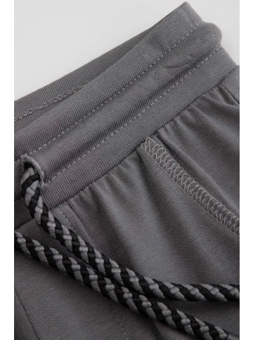 MOKIDA Jogginghose in grau