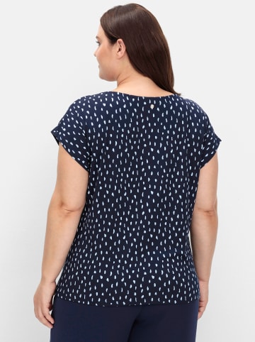 sheego Kurzarmshirt in tiefblau-gemustert