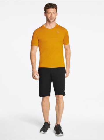 Ziener T-Shirt NICKLAS in dark mustard