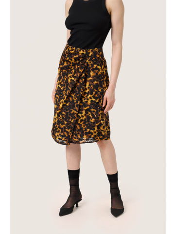 Soaked in Luxury Rock SLGunvy Feminine Form in Tortoise Print