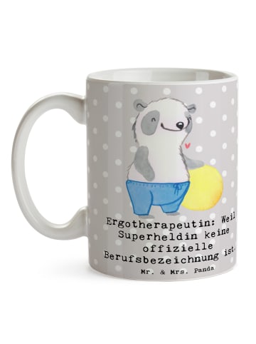 Mr. & Mrs. Panda Kaffeebecher Ergotherapeutin Superheldin mit Sp... in Grau Pastell