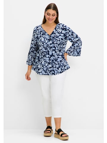 sheego Druckbluse in tiefblau-gemustert