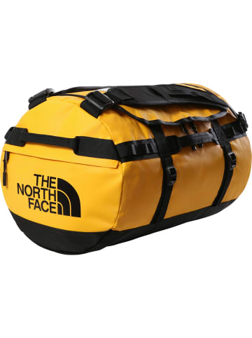 The North Face Reisetasche BASE CAMP DUFFEL - S in summit gold-tnf black