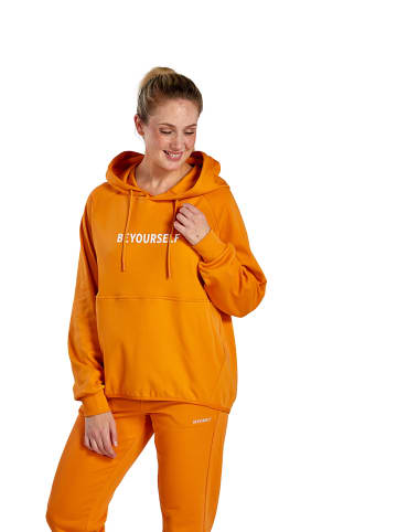 erima Studio Line EQUAL Hoodie in orange ochre