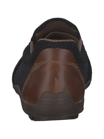 rieker Sportliche Slipper in schwarz/schwarz/amaretto