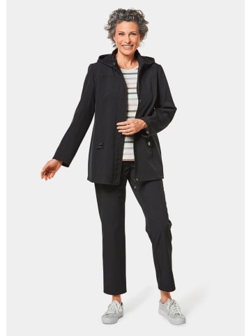 GOLDNER Kurzgröße:  Wasserabweisende Softshelljacke mit Kapuze in schwarz